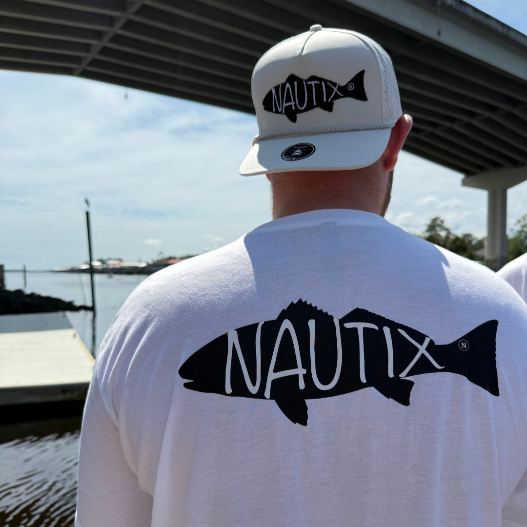 Close-up of black fish illustration with white Nautix lettering on Backwater tee