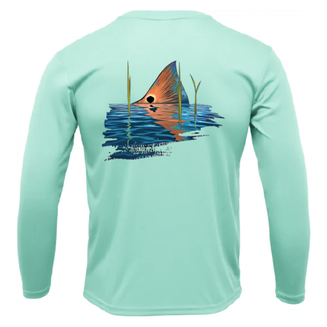 Blue performance fishing shirt with Tailing Red redfish sunset-style artwork on back